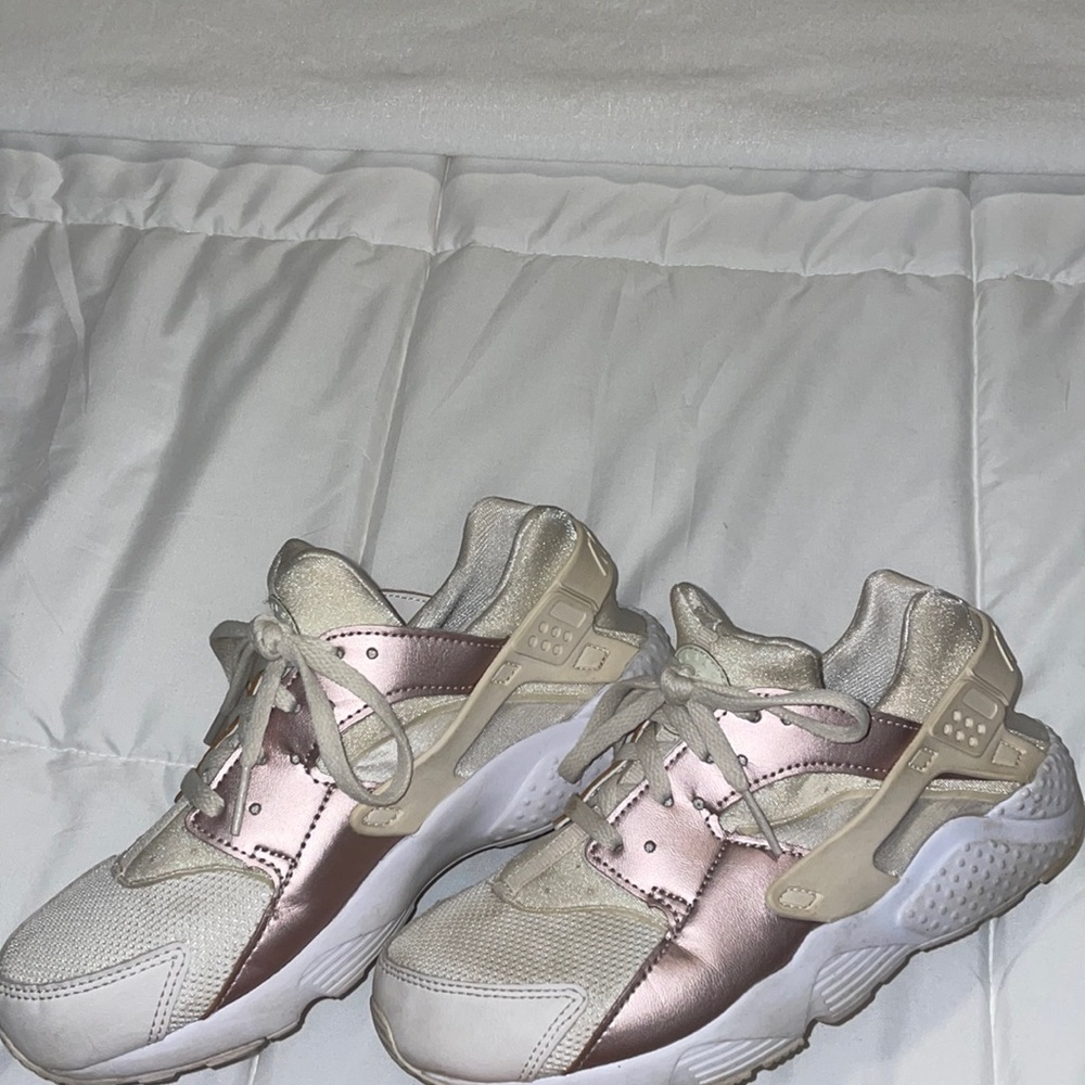 Rose gold and off white Nike Huaraches.